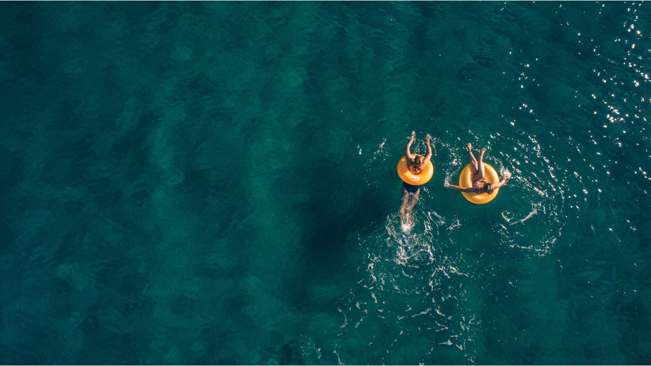 People floating on water - Slideshow
